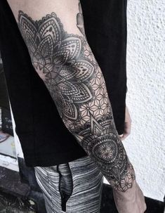 a person with a tattoo on their arm