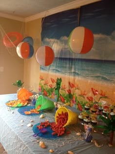 an ocean themed birthday party with balloons and decorations