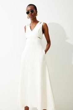 Cut With A Concise Approach, This Midi Dress Is Defined By Its Angular Detailing, Such As The Slashed Panels To The V-Neck Bodice And The Curved Open Back. This Elegant Piece Has A Fitted Waist, Side Pockets, And A Gathered A-Line Skirt That Calls For Streamlined Stilettos.V-Necklinecutout Bodiceopen Backmidi Length V Neck One Piece Dress, White V-neck Lined Midi Dress, Chic Dress Elegant, Chic V-neck Linen Midi Dress, Unlined Linen V-neck Midi Dress, Elegant White Linen V-neck Dress, White Linen V-neck Midi Dress, Sundresses For Women, Capsule Wardrobe Dresses