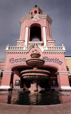 a building with a fountain in front of it