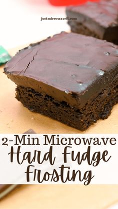 two brownies with chocolate frosting on top and the words 2 min microwave hand fudge