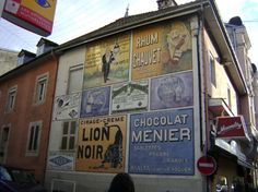 a building with many different signs on it