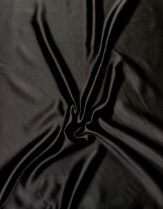 the black fabric is very soft and shiny