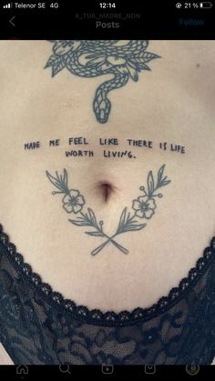 a woman's stomach with an inscription on it that reads, make me feel like there is life worth living