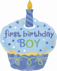 a blue cupcake shaped foil balloon with a lit candle on top that says first birthday boy