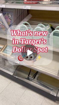 a display case in a store filled with lots of items and the words what's new in target's dollar spot