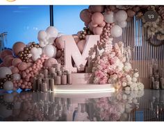 an image of balloons and letters on display