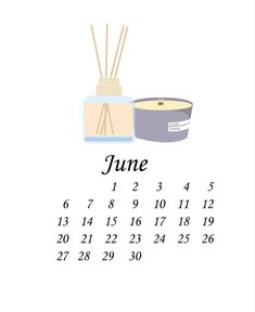 the calendar for june with candles and a candle holder on it, in front of a white background