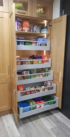 an organized pantry with lots of food in it