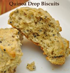 two pieces of food sitting on top of a white plate with the words quinoa drop biscuits