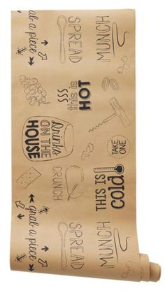 a roll of parchment paper with words and symbols on it, printed in black ink