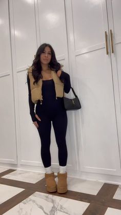 Jumpsuit Outfit With Uggs, Bodysuit With Uggs, Good Style Outfits For School Winter, Casual It Girl Outfits, Fits With Puffer Vest, Winter Fashion Outfits Uggs, Unitard Outfit Ideas Fall, Fall Outfits Bodysuit, Puffer Jacket Outfit With Uggs