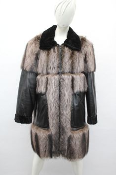 "BEAUTIFUL & VERY STYLISH RACCOON FUR COAT FOR WOMEN! IT IS ACCENTUATED WITH CARVED BLACK SHEARED BEAVER FUR COLLAR AND CUFFS. SLEEVES AND POCKETS AREA ARE MADE OUT OF BLACK LEATHER MATERIAL. THE COLLAR TYPE IS \"WING\", IT CLOSES WITH FRONT ZIPPER CLOSURE AND HAS TWO SIDE POCKETS. THIS ITEM IS PRE-OWNED: THE FUR AND THE INSIDE LINING ARE \"EXCELLENT\", THE BEST CONDITION POSSIBLE! AFTER BUYING THIS ITEM, IT WOULD BE VERY MUCH APPRECIATED IF YOU COULD PROVIDE YOUR HEIGHT, WEIGHT AND BUST CIRCUMF Coat Jacket Women, Raccoon Fur Coat, Wing It, Leather Coat Jacket, Coat For Women, Jacket Women, Fur Collar, Fur Collars, Leather Coat