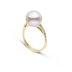 The gracefully curved solid gold and diamond band elegantly supports the lustrous 10.0-11.0 mm white Freshadama freshwater pearl. Freshadama pearls are sorted highest .01% of the freshwater pearl harvest each year. These pearls are exceptionally difficult to collect, and we've been proudly offering them for decades through our exclusive partnerships in Asia. With less than 5% deviation from a perfectly round shape, these pearls rival the finest saltwater pearls.By purchasing these pearls, you ar Elegant Diamond White Pearl Rings, Elegant White Gold Diamond Pearl Ring, Elegant Pearl Rings In Diamond White, Elegant Diamond White Pearl Wedding Ring, Elegant Pearl Wedding Ring, Elegant White Gold Pearl Ring, Elegant Wedding Pearl Ring With Diamond Accents, Elegant White Gold Pearl Ring With Diamond Accents, Elegant Pearl Ring With Diamond Accents For Wedding