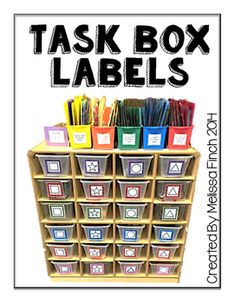 an organized classroom storage area with bins and labels on the bottom shelf for children's books