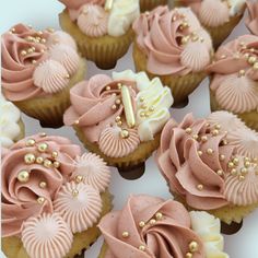 cupcakes with pink frosting and gold decorations