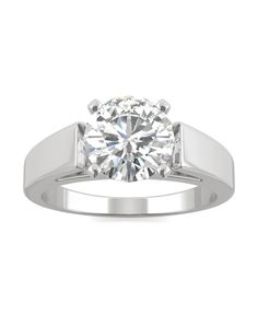 a diamond engagement ring on a white background