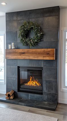 a fireplace with a wreath on the mantle