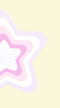 a pink and white star shaped object on a yellow background