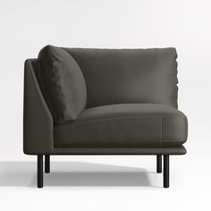 a black couch with pillows on it