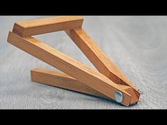 a small wooden object sitting on top of a table