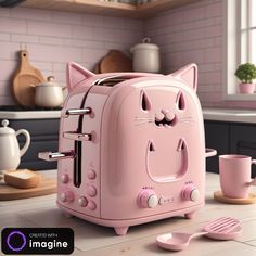 a pink toaster with a cat face on it