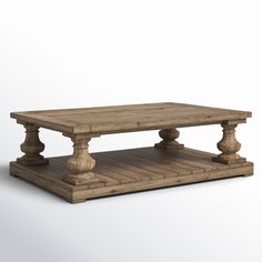 an old wooden coffee table on a white background