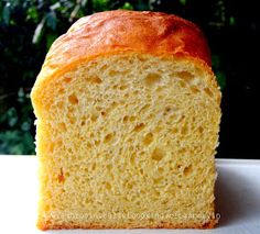 a loaf of bread sitting on top of a white table