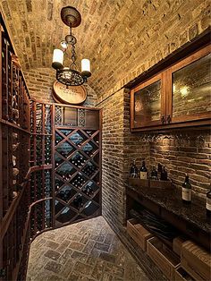 a wine cellar with lots of bottles in it