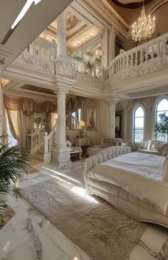 a large bedroom with white furniture and chandelier