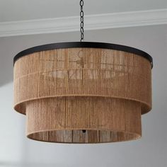 a chandelier hanging from a ceiling in a room