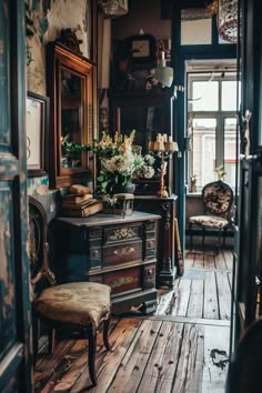 an old fashioned dresser and chair in a room