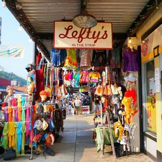 an outdoor market with lots of items for sale