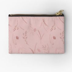 a small pink zippered pouch with flowers on it