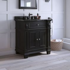 a bathroom with white walls and wood floors