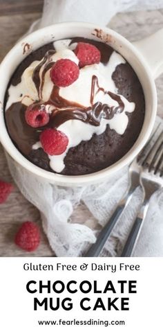 chocolate mug cake with raspberries and whipped cream on top in a white bowl