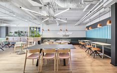 an empty restaurant with tables and chairs