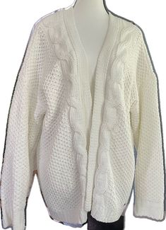 White V-neck Cable Knit Cardigan, White Trendy Acrylic Cardigan, Trendy White Acrylic Cardigan, Acrylic Chunky Knit Cardigan For Layering, Chunky Knit Acrylic Cardigan For Layering, Oversized Knit Casual Cardigan, White Casual Chunky Knit Outerwear, Casual White Chunky Knit Outerwear, White Chunky Knit Casual Outerwear