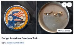 a pin with an american flag on it next to a photo of a train brochure