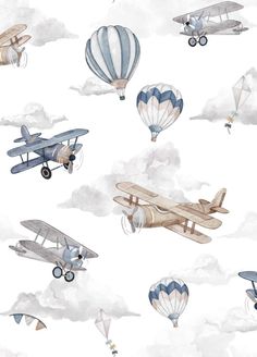 several airplanes and hot air balloons in the sky