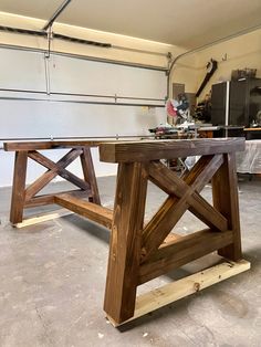 a table made out of wood in a garage