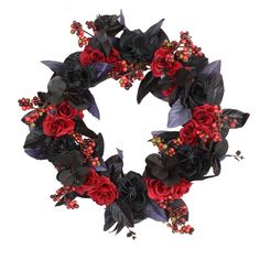 a wreath with red and black flowers on it