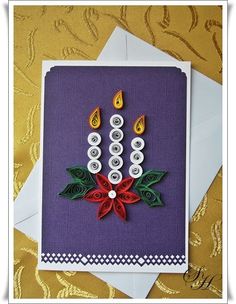 a purple card with buttons and bows on it