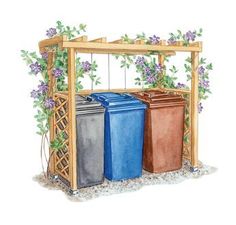 three recyclable trash cans sitting in front of a pergolated trellis