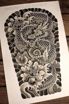 an ink drawing of a dragon with flowers on it's back and the words inkjoy studio student written below