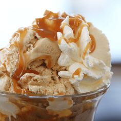 an ice cream sundae with caramel drizzle on top