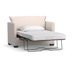 a couch with a pull out bed attached to it's backrest and mattress