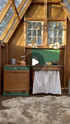 an old fashioned kitchen is in the attic