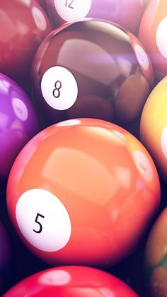 a pool table filled with lots of different colored billiards and numbers on it