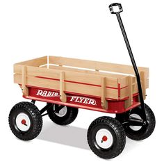 the radio flyer wagon is made from wood and has four wheels, two large tires, and